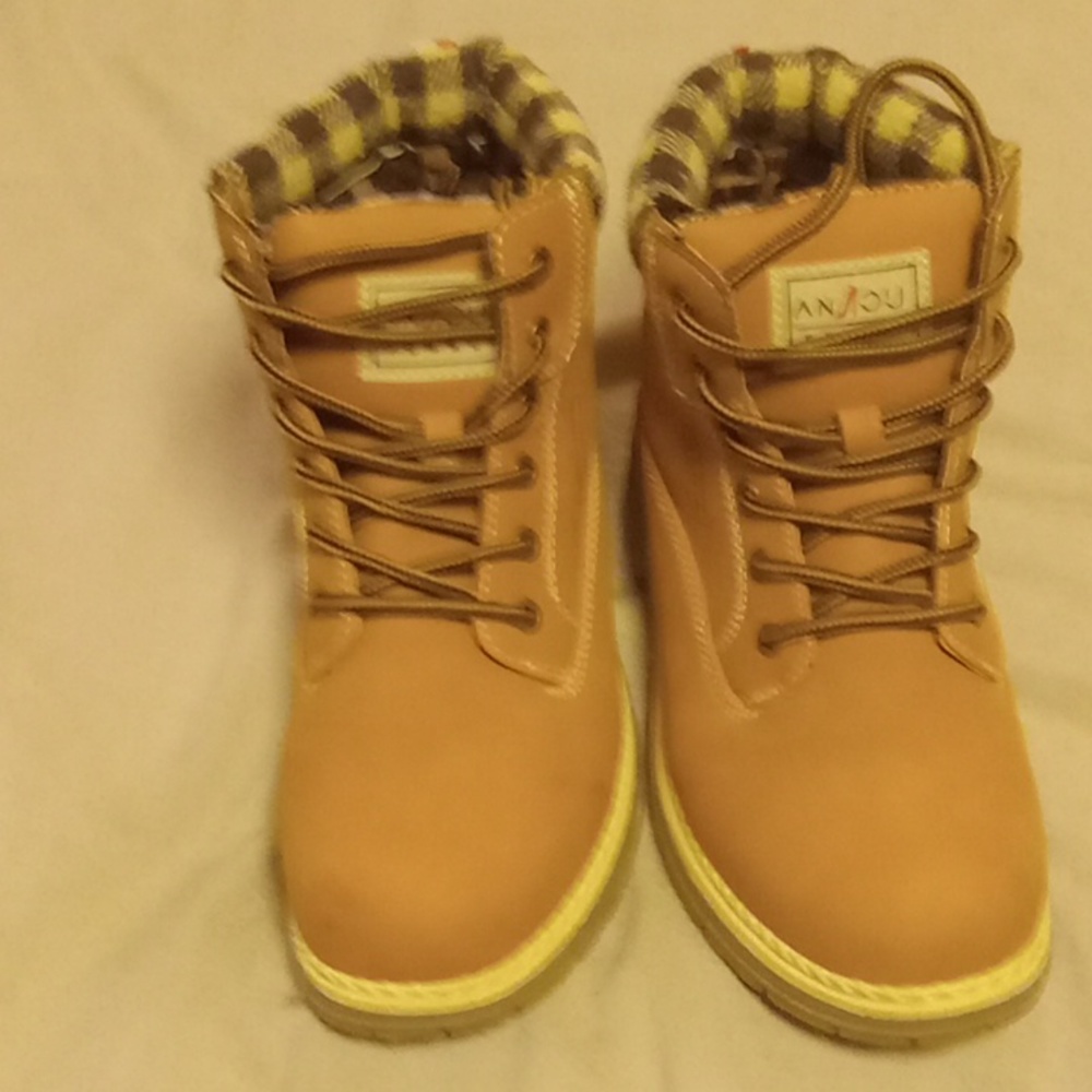 Brand new Adorable Woman tan and flannel lining boots! (No box)
